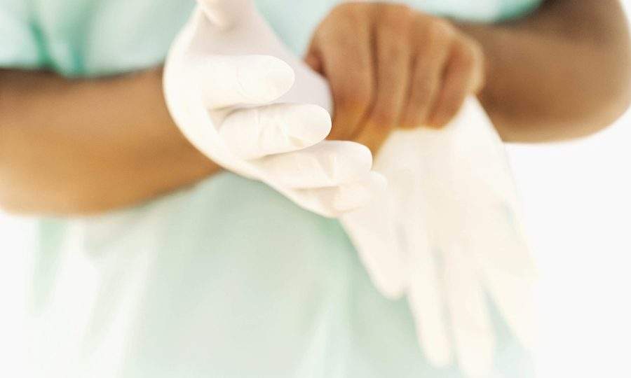 STK_doctor_wearing_gloves-2000x1200