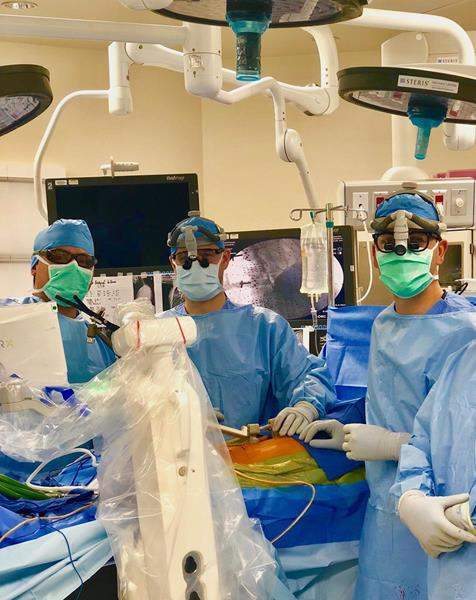 Virginia Spine Institute surgeons perform surgery using robotic guidance system
