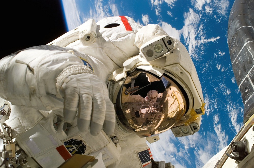 Astronaut 3D printing in space