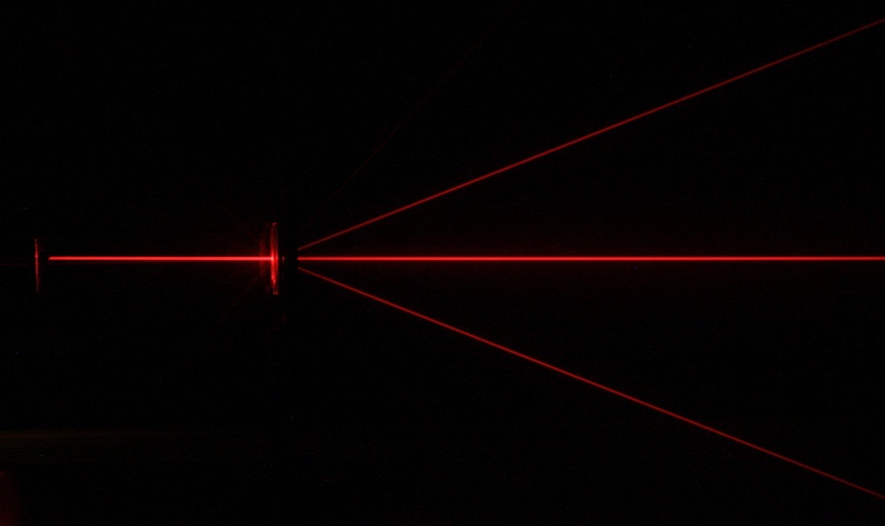 Diffraction of a red Laser beam with a  diffraction grating