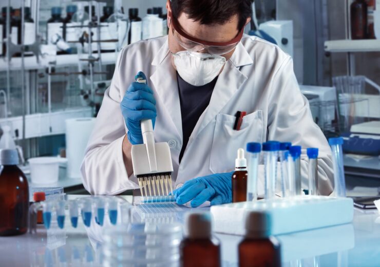 Lab,Technician,Pipetting,Plate,In,The,Genetic,Laboratory,/,Scientist